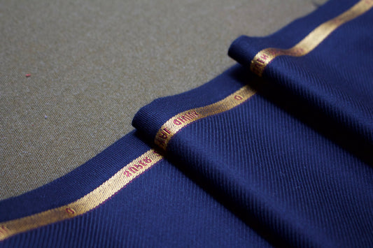 Huntsman Gold Seal Super 210’s Cashmere and Royal Qiviuk